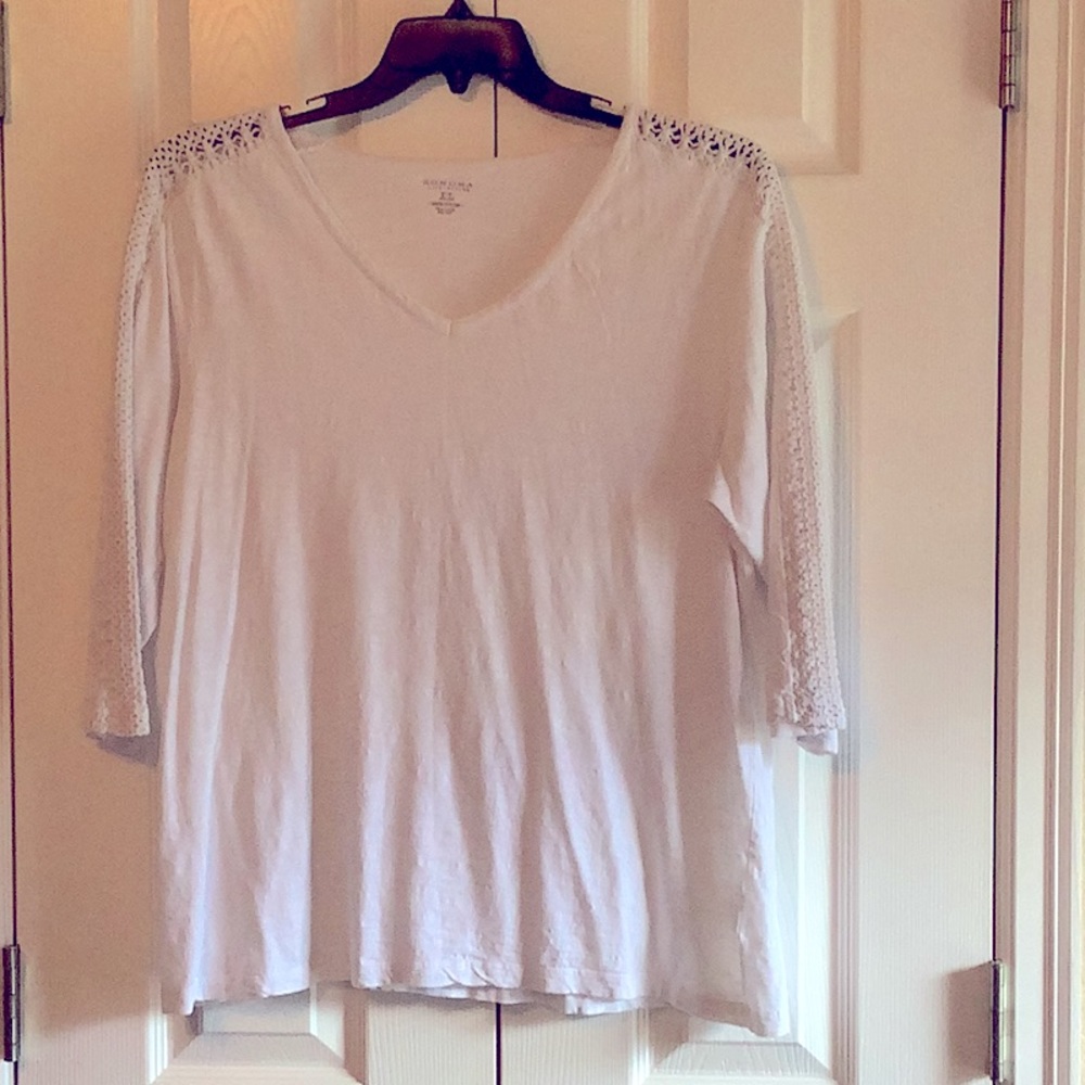 3/4 sleeve top with lace inserts.